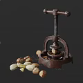 Vintage Nut Press With Fresh Pistachios And Crushed Nut Pieces