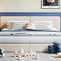 Kids Bed With Striped Pillows Owl Plush Toy And Playful Wooden Toys