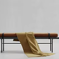 Brown Fabric Sofa Bench With Black Metal Frame And Yellow Throw Blanket