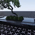 Water Fountain with Curved Tree Green Bushes on Black Platform and Patterned Tiled Floor