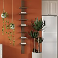 Hanging Potted Plants And Large Greenery On Orange Wall With Wooden Shelves And White Refrigerator