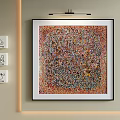 Vibrant Abstract Painting Hanging On Beige Wall With Small Decorative Blocks And Lighting