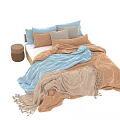 Cozy Double Bed With Light Blue Beige Textured Quilt And Decorative Pillows