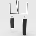 Two Black Punching Bags for Sports Training Hanging on Metal Frame