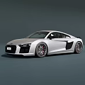 Silver Audi R8 Two Door Sports Car With Sleek Exterior And Alloy Wheels