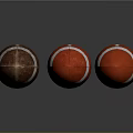 Three Brown And Red Footballs With White Stripes On Dark Background