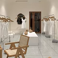Modern Clothing Store Interior Design With White Clothes Display Table Arched Doors And Ceramic Vases 3d model
