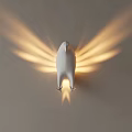 White Bird Shaped Wall Lamp On Light Wall With Warm Spreading Light Shadow Effects 3d model