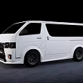 White Toyota Van With Modern Exterior Design Black Alloy Wheels And Tinted Windows
