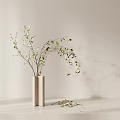 Indoor Potted Plant Decoration With Light Colored Vase Green Leaf Branches And Scattered Leaves