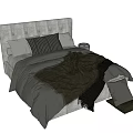 Modern Double Bed With Upholstered Headboard Gray Green Black Blankets And Throw Pillows
