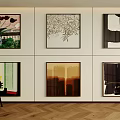 Abstract Paintings Display On Interior Wall With Diverse Styles And Herringbone Wooden Floor Accent Chair
