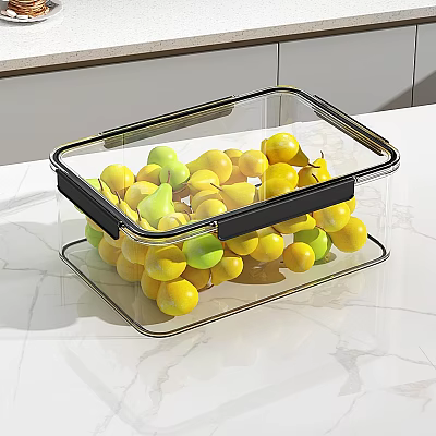 Fresh Yellow And Green Fruits Stored In Transparent Container On Marble Countertop 3d model