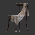 Vintage Wooden Leisure Chair With Beige Cloth Draped And Natural Wood Texture
