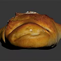Artisan Braided Bread With Golden Brown Crusty Surface Topped With Sesame Seeds And Raisins