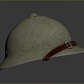 Vintage Metal Helmet With Worn Surface And Red Leather Strap Buckle