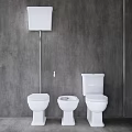 Modern White Toilets In Bathroom With Gray Wall Background And Simple Design