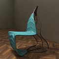 Teal Leaf Shaped Outdoor Chair With Black Metal Frame And Modern Design
