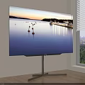 Curved Smart TV Displaying Sunset Water View With Metal Stand In Room