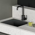 Modern Kitchen Countertop With Black Faucet Square Sink And Fruit Basket