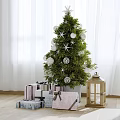 Decorated Christmas Tree With Star Ornaments Gifts And Wooden Lantern Indoors