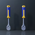 Two Hardware Tools Wrenches With Blue And Yellow Handles Metal Heads On Dark Gray Surface