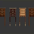 Four Different Colored Small Wooden Cabinets With Drawers And Slender Legs On Dark Background
