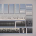 Feature Wall Design With Various Textured Metal Panels In Silver And Gray Tones