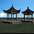 Chinese Garden Landscape Featuring Two Traditional Pavilions With Black Roofs And Green Grass