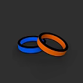 Two Blue And Orange Rings Placed On Black Background Surface 3d model