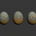 Three Decorative Egg Shaped Sculptures with Gold Specks and Blue Gray Texture