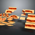 Assorted Orange Brown Sliced Block Items In Various Shapes With Texture