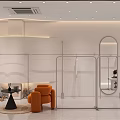 Modern Clothing Store Interior With Metal Racks Orange Armchair And Round Mirror