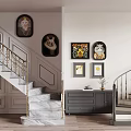 Staircase with Golden Railings Marble Steps and Cat Decor Paintings Wall Gray Cabinet Wooden Floor