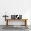 Modern Minimalist Bench With Gray And Striped Pillows Side Table Plant Book On Gray Rug