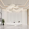 Elegant Sleek White Reception Desk With Unique Wavy Chandelier In Bright Luxury Commercial Lobby