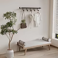 Minimalist Modern Indoor Entryway with Hanger Rack Clothes Bench and Potted Plant