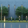 Outdoor Lights With Different Heights And Designs Among Green Trees And Grass With Water Reflection 3d model