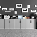 Organized Office Workspace With Essential Appliances Cabinets Framed Wall Pictures And Printers