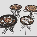 Decorative Plant Patterned Metal Tables With Intricate Floral Designs And Ornate Scroll Legs