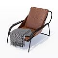 Modern Brown Leather Lounge Chair With Black Metal Frame And Checkered Blanket