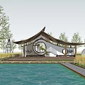 Wooden Pavilion With Circular Window And Windmill By Water Pool In Rice Field