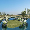Beautiful Natural Waterside Landscape With Clear Blue Water Lush Reeds Green Grass Under Bright Sky