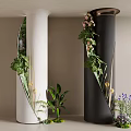 White And Black Decorative Columns With Mirror Accents And Green Plants