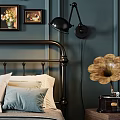 Classic Double Bed with Dark Metal Headboard Blue Bedspread White Pillows Gray Throw and Navy Blue Walls