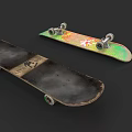 Two Skateboards One Worn And One With Colorful Graphic Design
