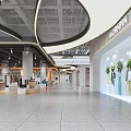 Modern Shopping Mall Lobby Interior With Circular Counter And Green Plants