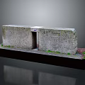 Stone Garden Ornament with Small Opening and Green Moss on Base
