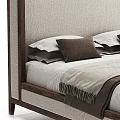Double Bed Featuring Wooden Frame Upholstered Headboard Brown White Pillows and White Sheets