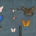 Colorful Everyday Magnifying Glass With Various Patterned Butterflies On Blue Background